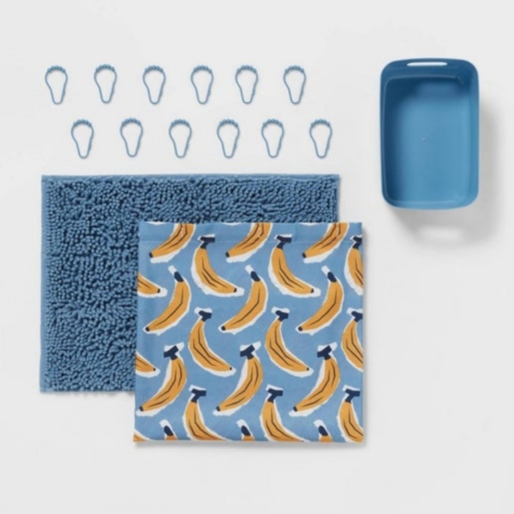 Shower curtain set with rug and rings